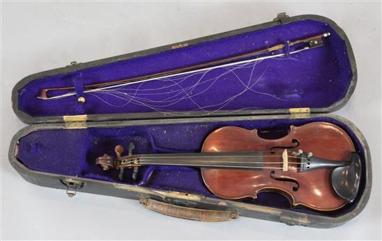 A half size violin with one piece back, bearing label Compagnon, overall 19.5in., cased with bow